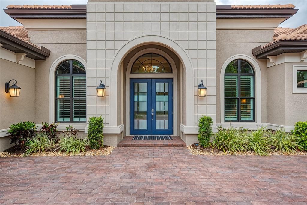 Front of the home with a side entry garage