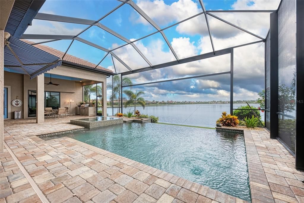 Infinity Edge Saltwater Heated Pool and Spa with beautiful Lake views