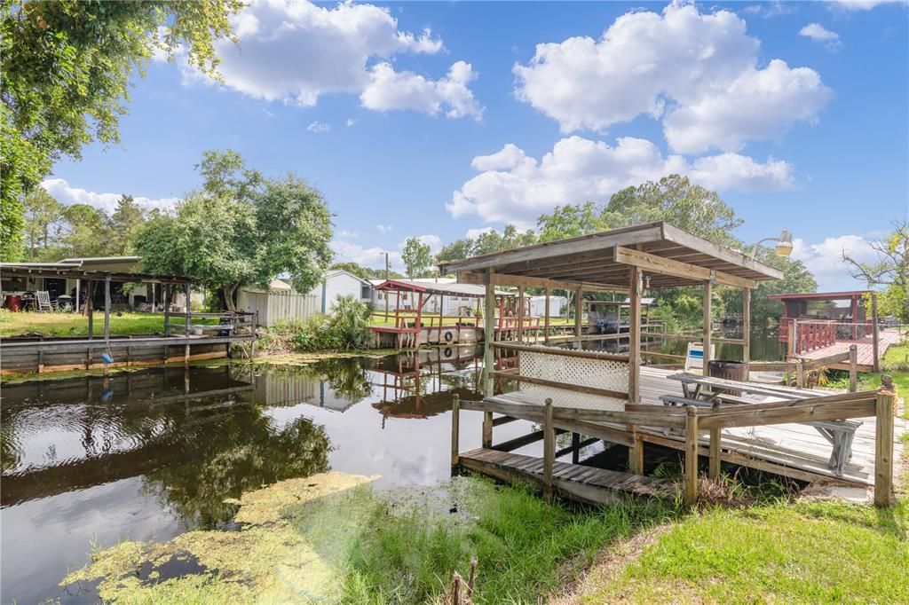 Covered Dock on canal leading to Lake Yale