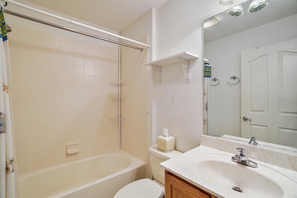 Guest bathroom with tub/shower combination