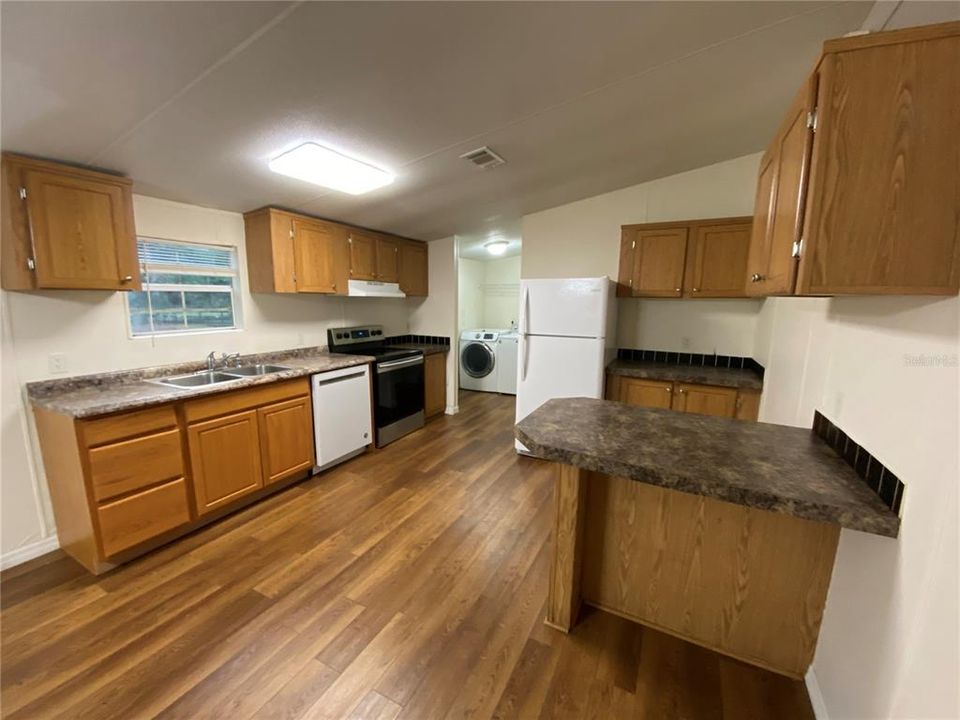 Kitchen with Laundry Room and Pantry Behind