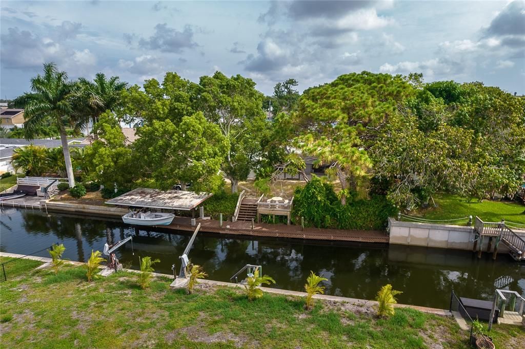 Over 80 feet of canal frontage, shed for extra storage and so much more!
