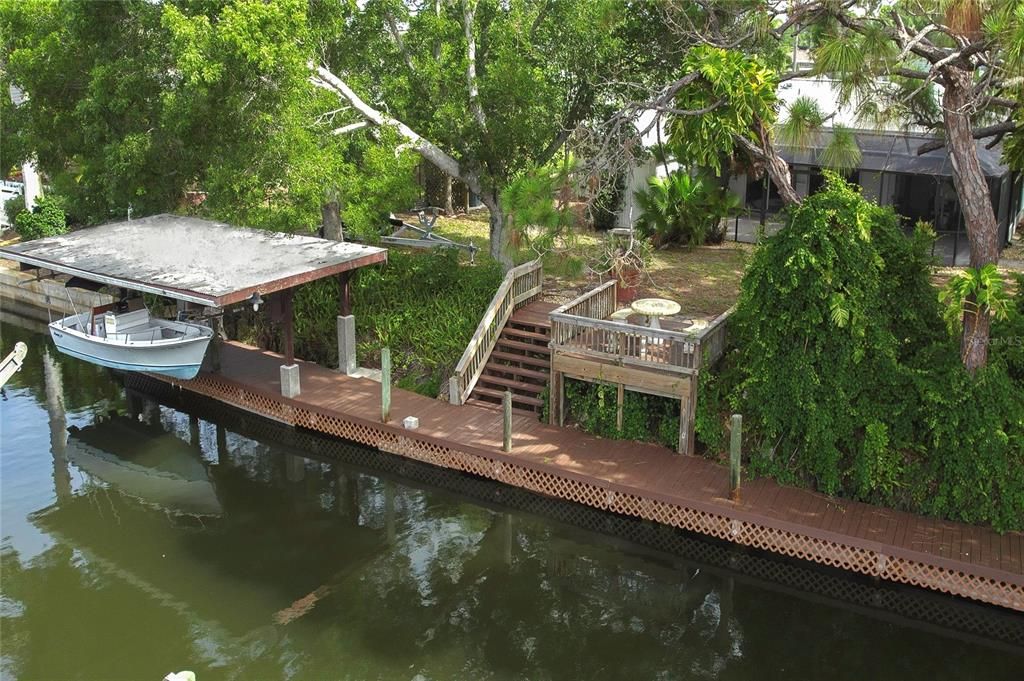 86 feet of canal front with your own covered lift. 17 ft Shamrock also available.