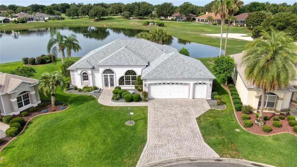 Custom Home on a Pond and Golf course Views!