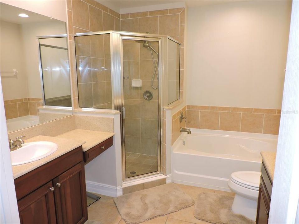 Master Bathroom with double sinks, make-up counter, garden tub and separate shower.