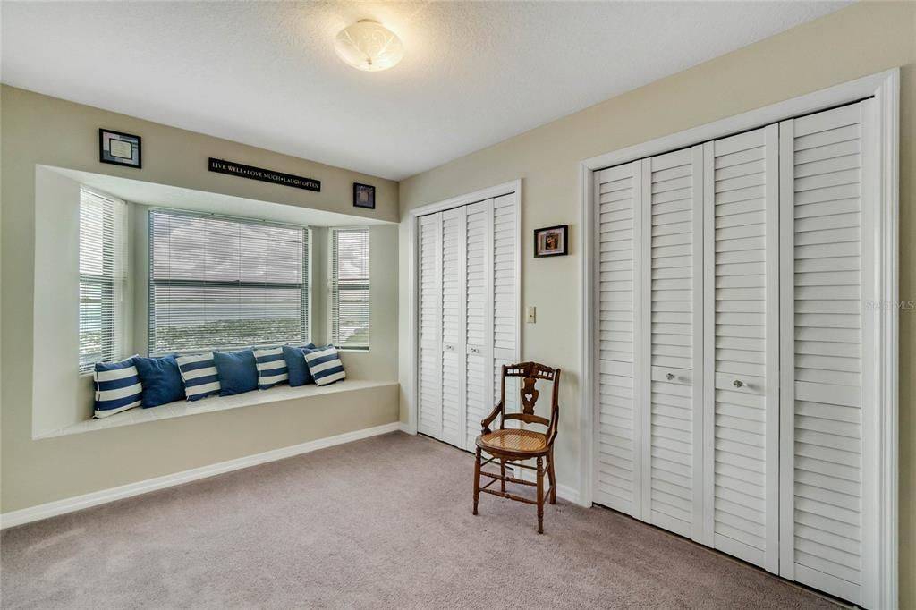 Master Bedroom Suite features a Dual Closet and a Sitting Area overlooking Lake Lowery