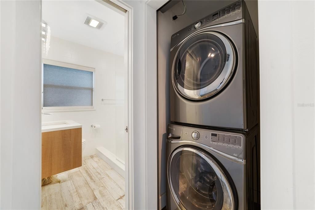 Washer and dryer with electric garage door