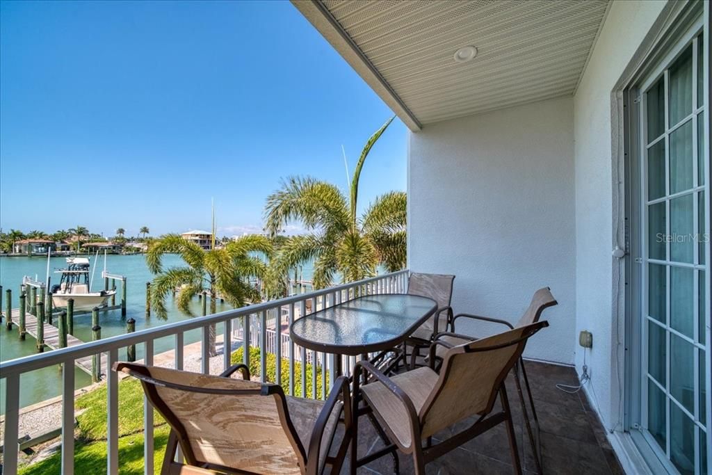 Spacious balcony with view of your DEEDED DEEPWATER BOAT SLIP!