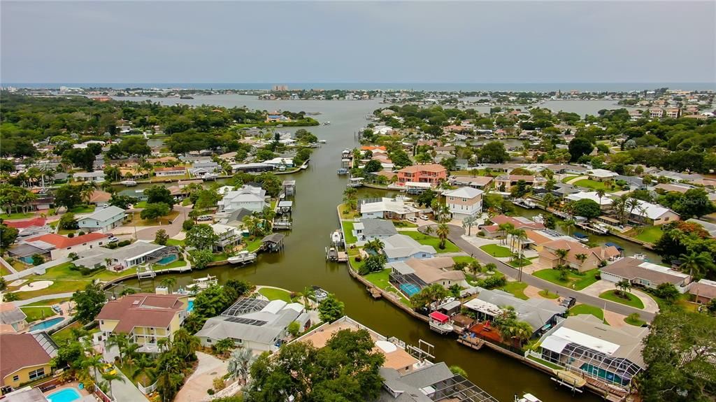 Aerial view (house in the middle in lower left), looking down the canal towards the Intra-Coastal.