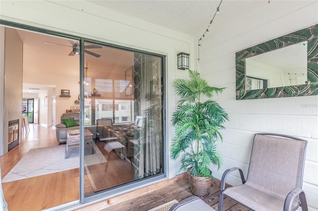 Want to enjoy the outdoors? Just throw open the sliding doors! The upstairs patio extends your year round living space.