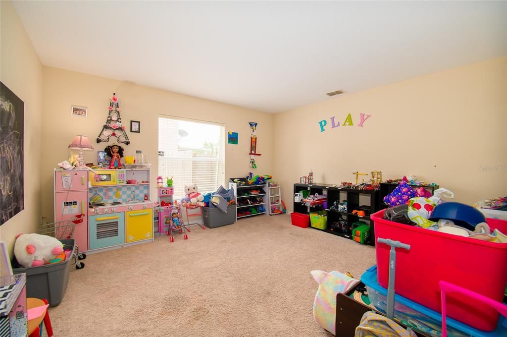 Formal Living used as a Playroom.