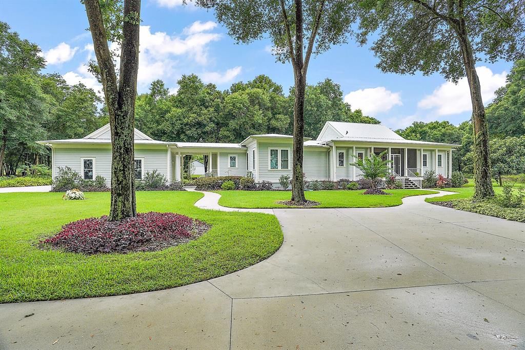 Beautiful 3+ Acre Estate with Private Airplane Hanger and Attached Covered Storage