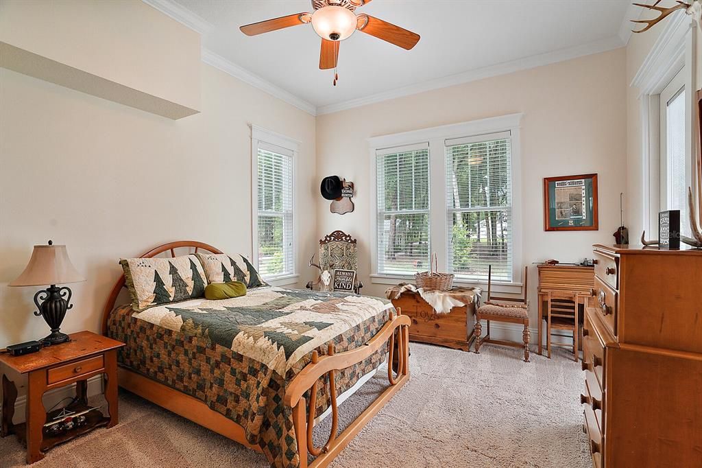 Master Bedroom 3 with Crown Molding and Direct Access to the Back Porch