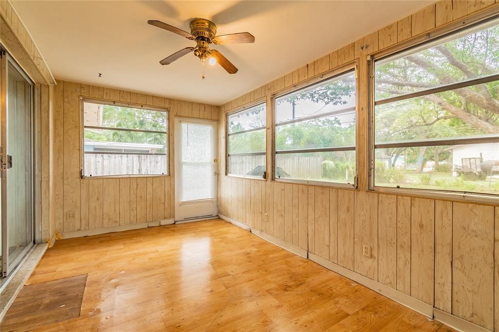 This Florida room connects you to the nice sized backyard.