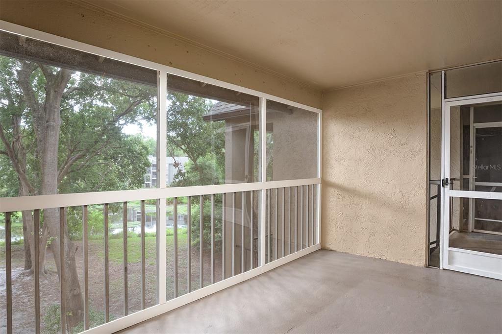 This unit features a cozy covered/screened porch with crystal clear Acrylic panels installed in 2021 to keep out pollen and dust while preserving the picturesque water views.