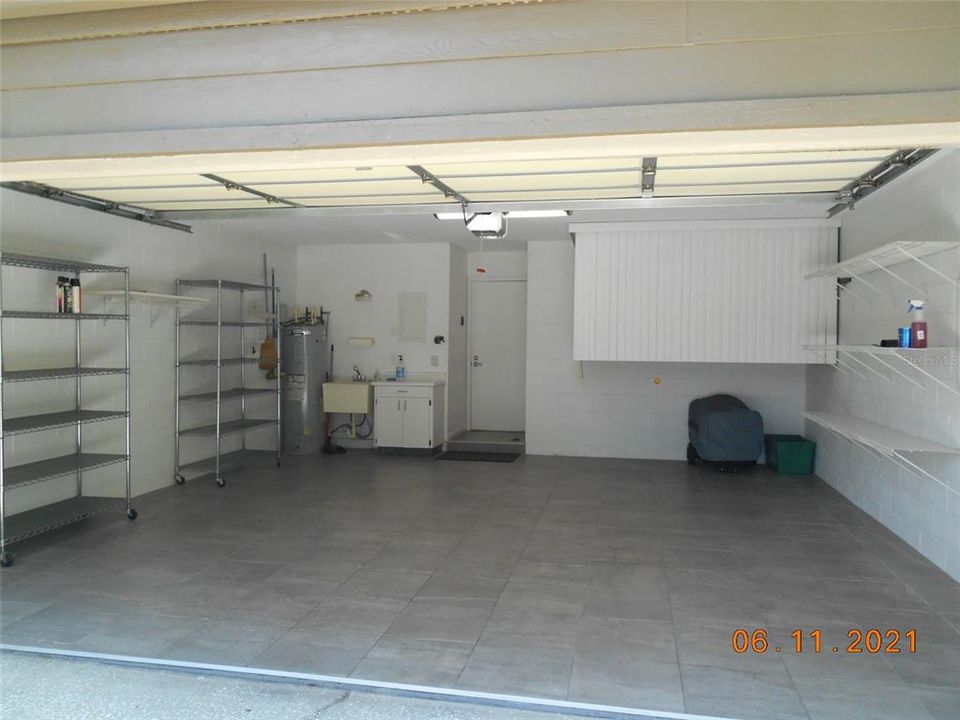 Garage with Tile Floors & Plenty of Storage