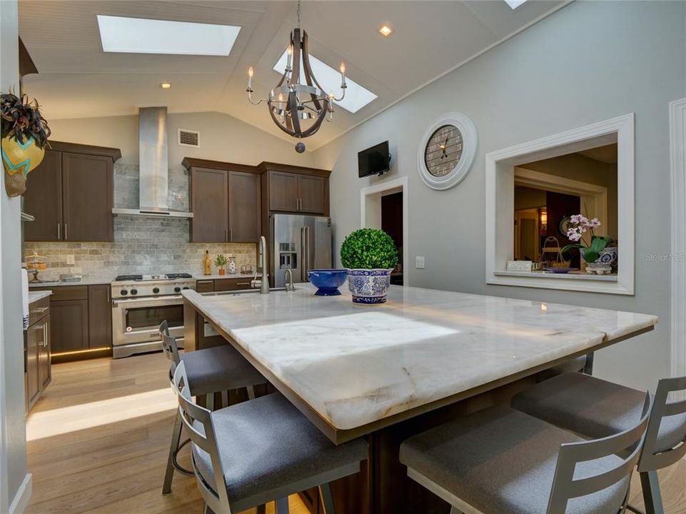 Remodeled kitchen with granite lighted island