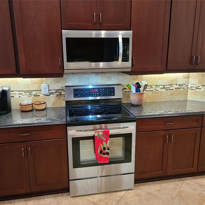 Stainless Steel convection oven and microwave in kitchen