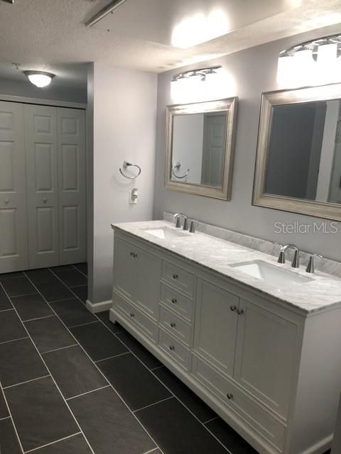 Bathroom with dual vanities