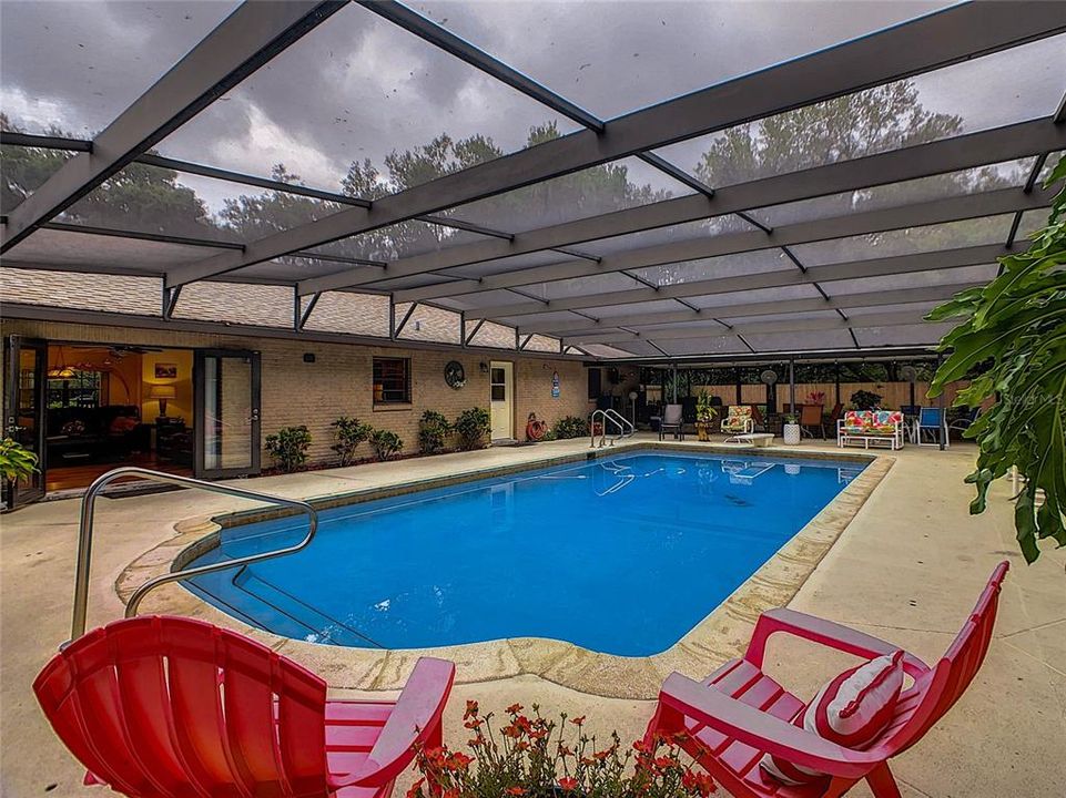 The back yard and pool area provide your own private retreat with an oversized 16??? X 32??? pool and 38??? x 63??? screened lanai.