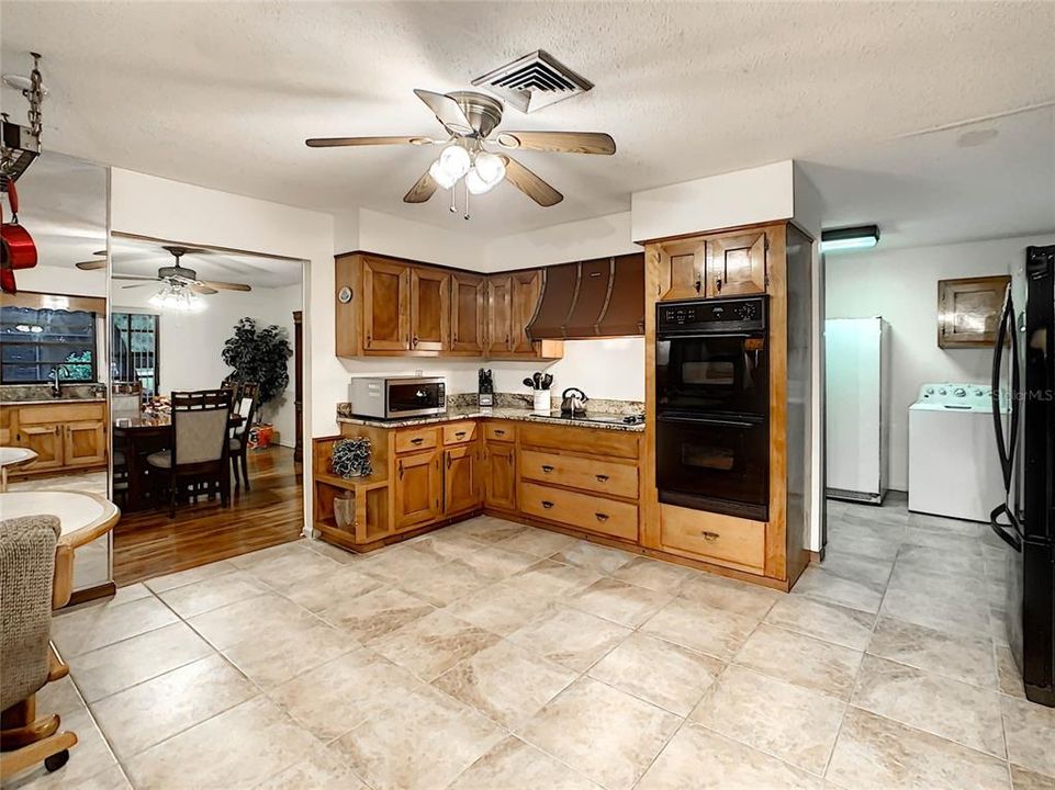 Large kitchen with plenty of work space and includes a double oven.
