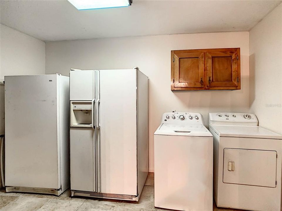 Large inside utility with plenty of room for extra appliances.