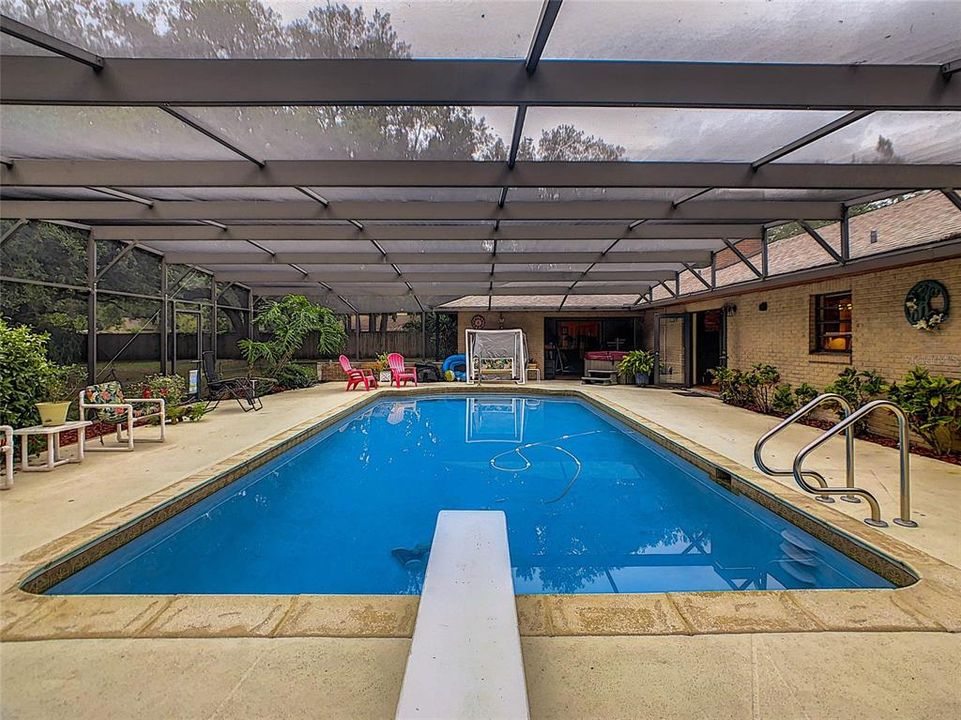 The back yard and pool area provide your own private retreat with an oversized 16??? X 32??? pool and 38??? x 63??? screened lanai.
