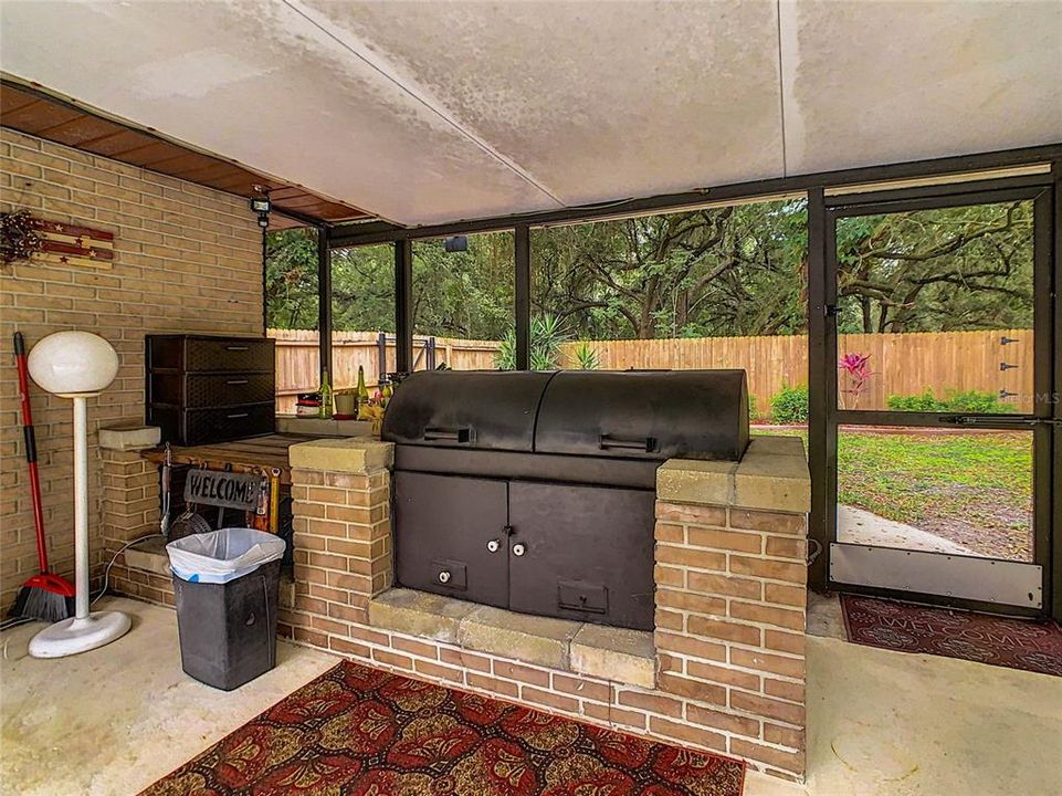 This home even a built in bar-b-q grill for the grill master.