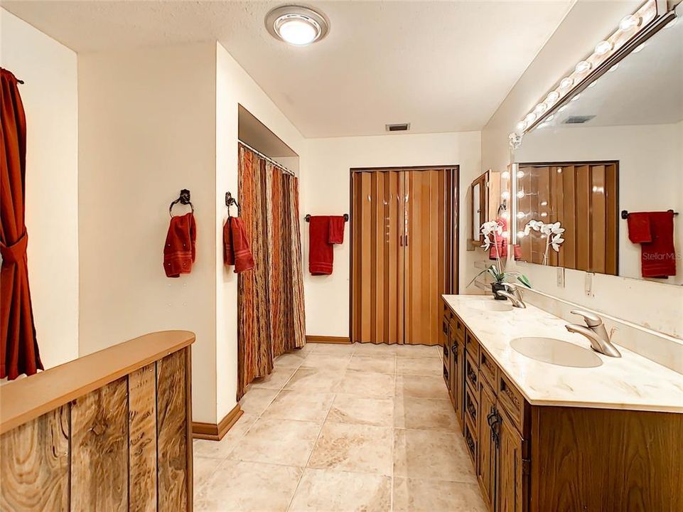 Master Bath has dual sinks and a large closet at the back of the bathroom.