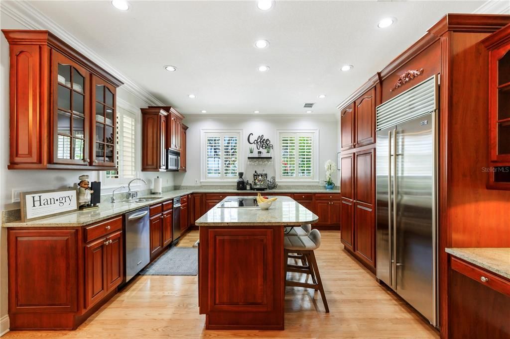 Now this is a kitchen!  Plenty of preparation space, best of breed appliances, breakfast bar.