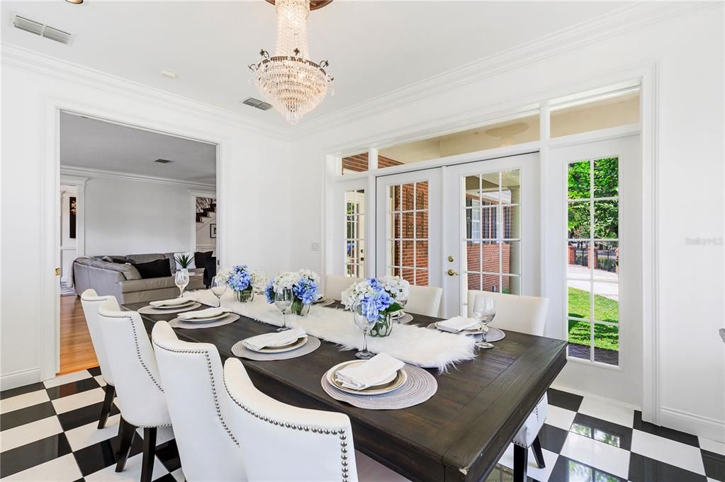 Classic and timeless, panoramic views from the formal dining room... inviting the outdoors in...stunning!