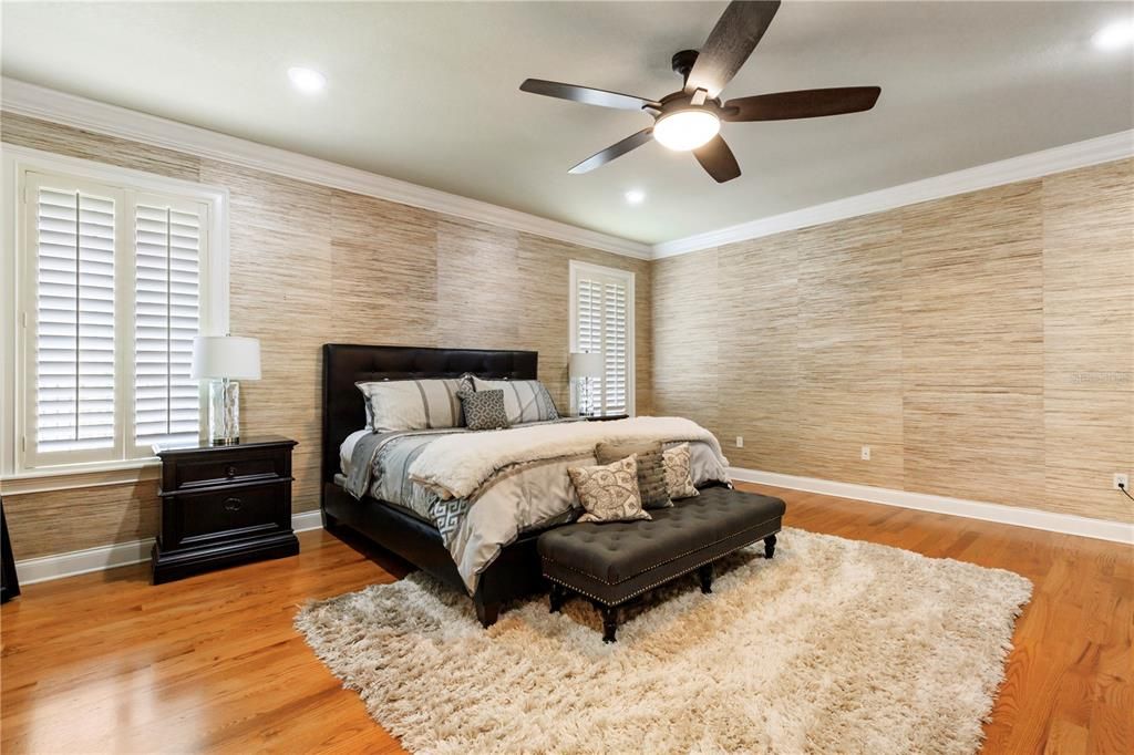 This is a huge Master Suite, with designer Grass cloth wall paper, and gleaming hardwood floors