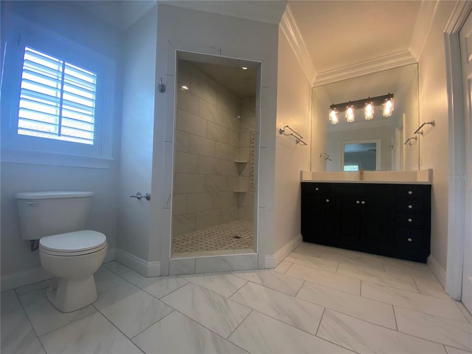 En-suite bath in one of the upstairs bedrooms ( 2nd Master suite) newly remodeled and stunning