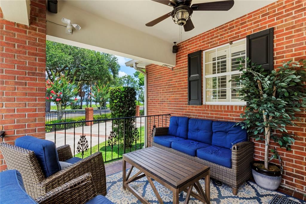 This side porch patio has great space for plenty of seating and a great view of Lake Hollingsworth.
