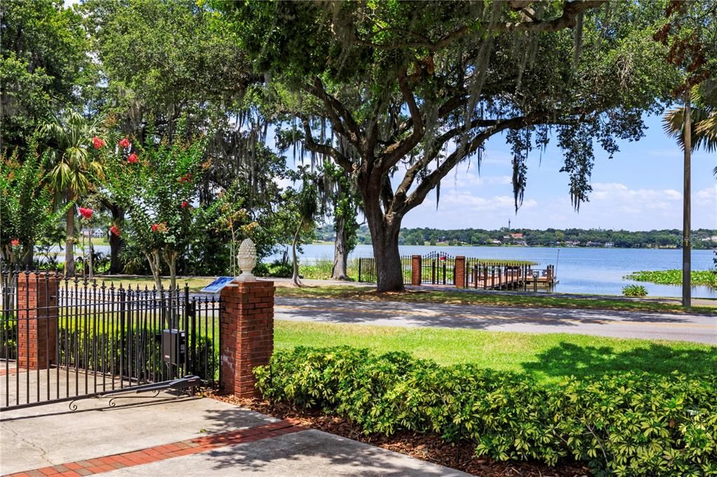 View from the side porch of 2221 Brandon Rd on to Lakeland Hollingsworth. The dock just beyond is deeded to the home along with 150ft of lake front