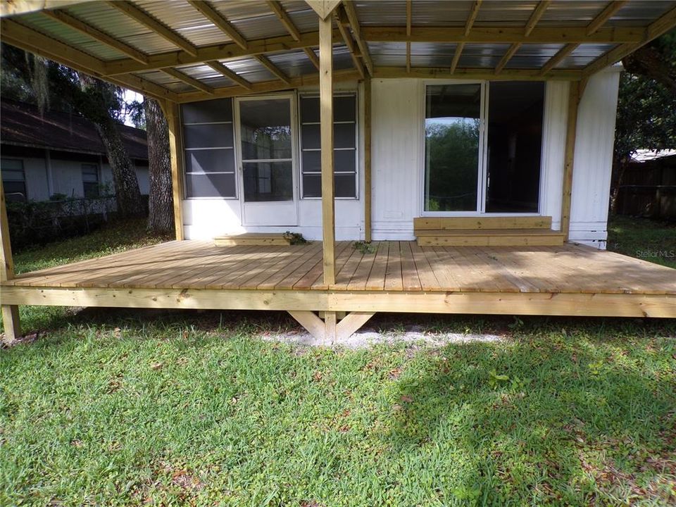 View of new porch/deck on the rear of the house