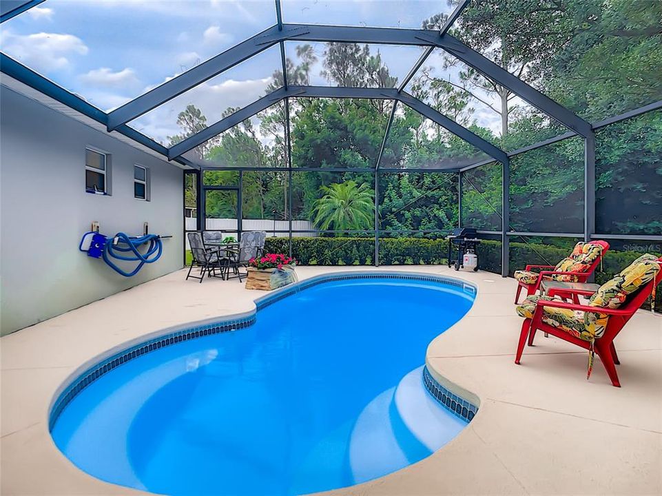 The screened in pool/lanai is perfect for entertaining