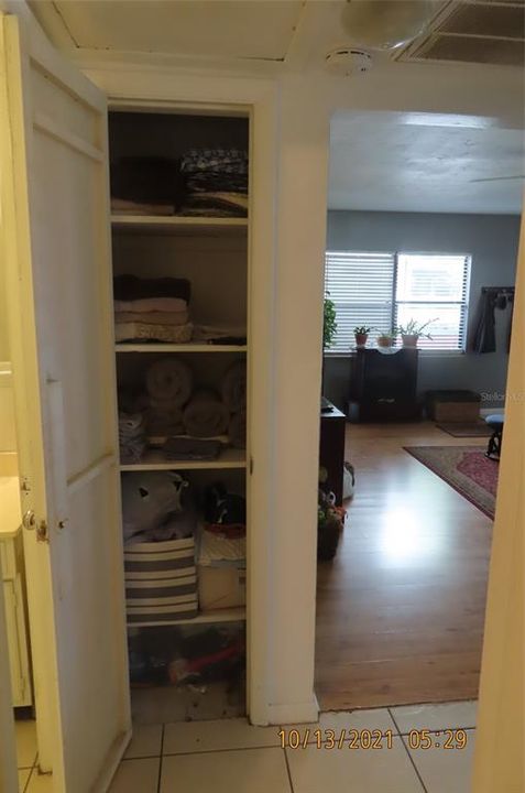 Linen Closet and looking into living room.