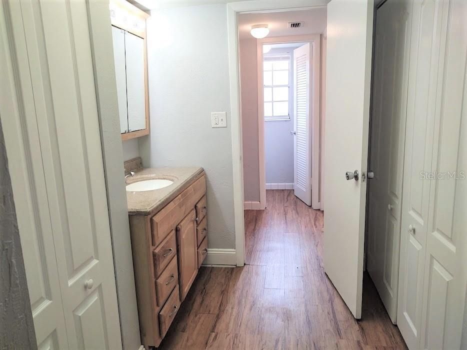 Access to bathroom vanity and closets