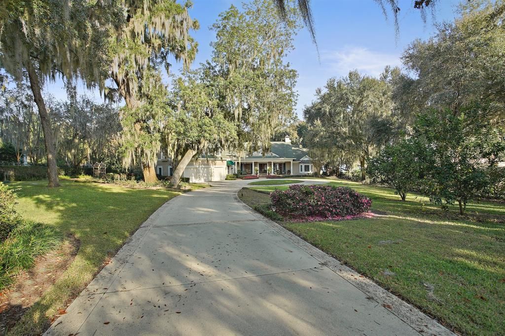 Lovely scenic drive that leads you to a circular driveway, to one of a kind private and secluded luxury home!