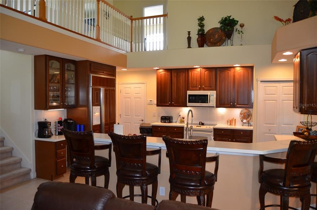 Cat walk looks down on family room and kitchen.