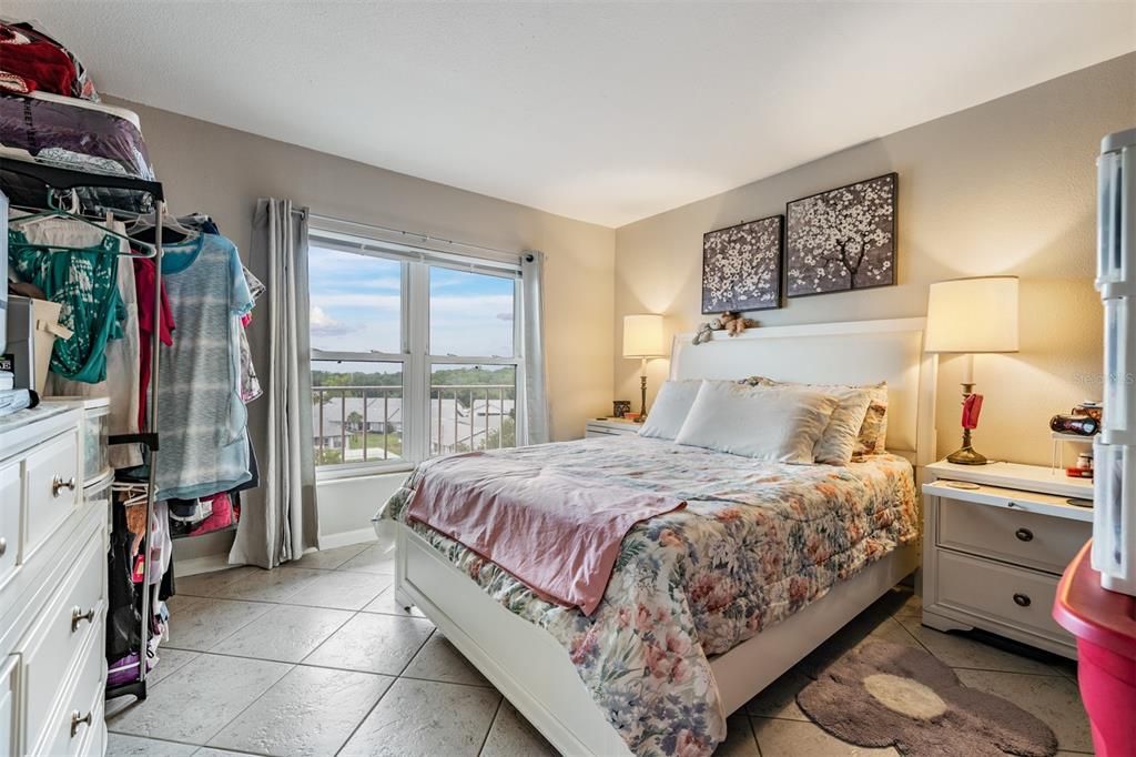 Master bedroom features breathtaking city views and tile floors, and double pane windows.