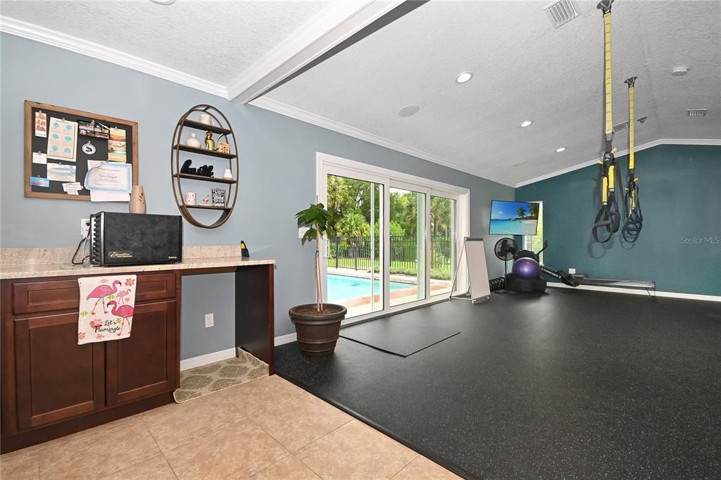 Home Gym/4th Bedroom has kitchenette and can be an in-law suite.