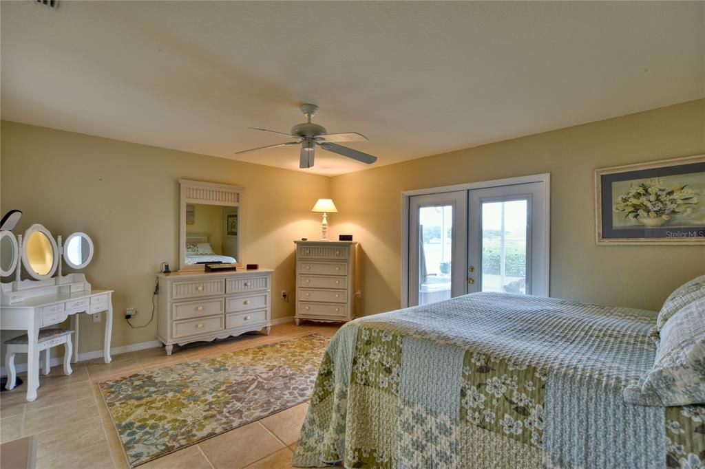 Owners Bedroom with French doors to lanai