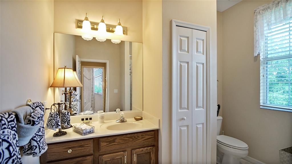 The upstairs bath features a nice vanity and spacious linen closet.