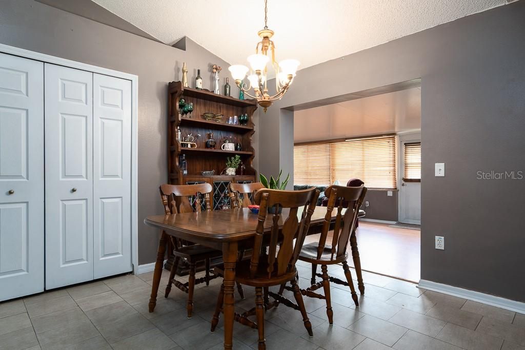 Dining room. Laundry closet at left. Great room and back door afar.