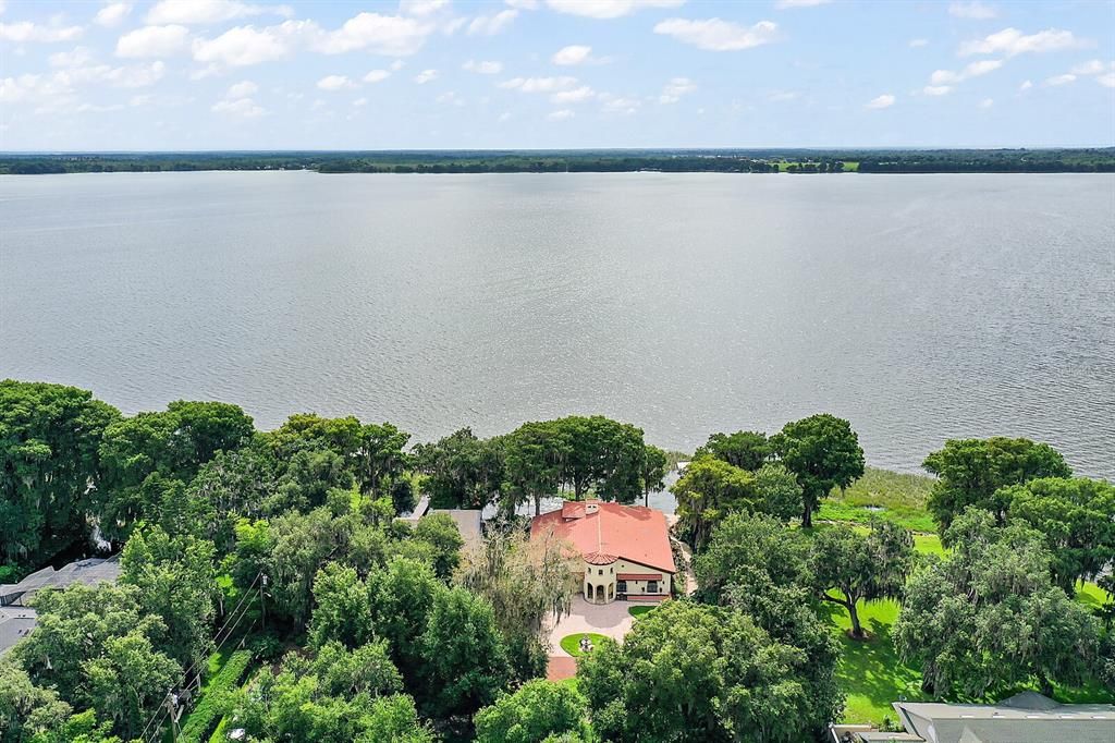 Beautifully updated 4 bedroom Mediterranean lakefront estate on Little Lake Harris.