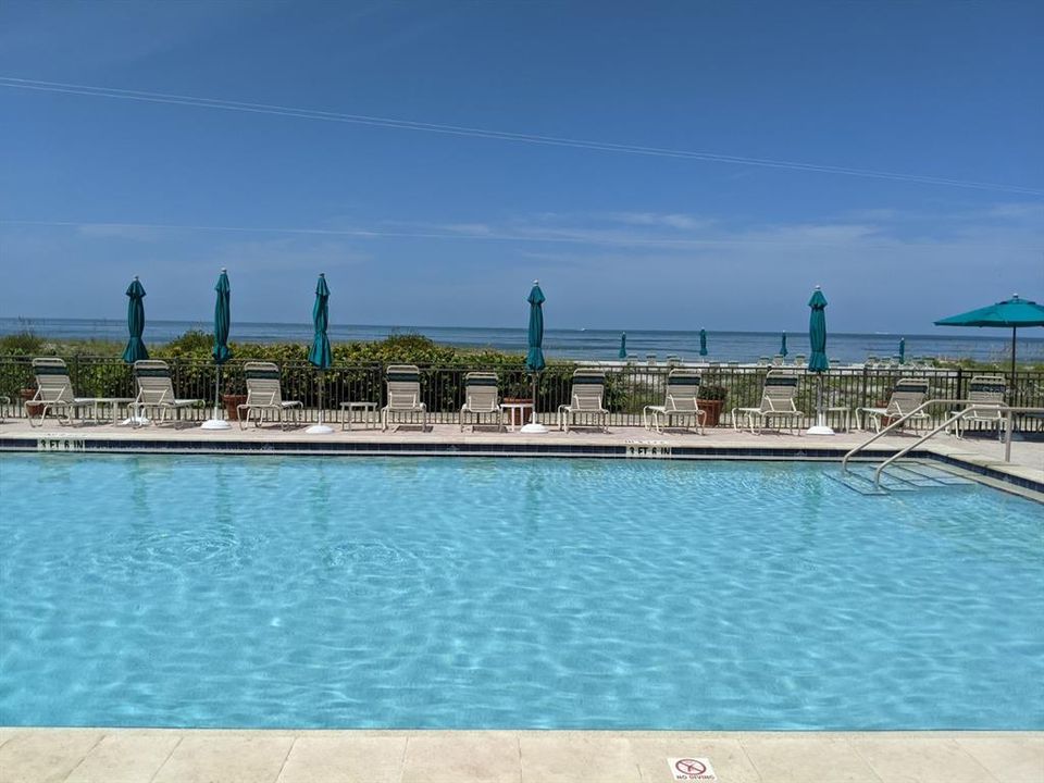 Resort style pool right on the beach steps away from the condo