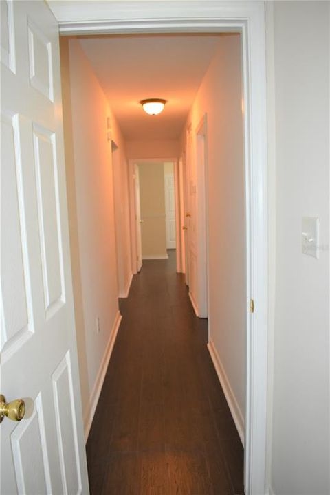 Hallway to other rooms and 2nd bathroom
