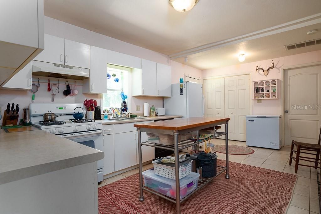 Large kitchen includes all appliances. Laundry closet afar left